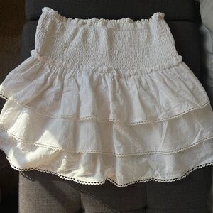 White, eyelet trim, high-waisted mini skirt